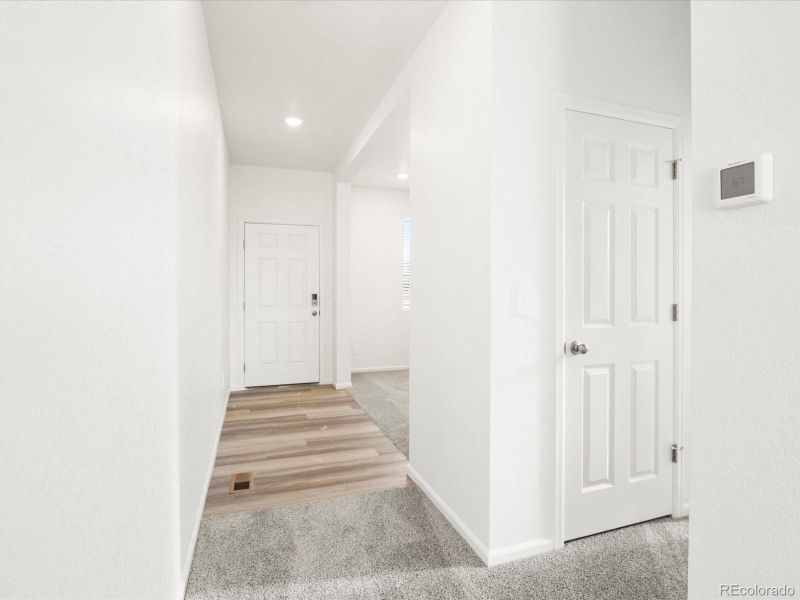 Spacious, unfurnished interior of a new home in Ridgeline Vista: The Flora Collection, Brighton (Image 32).