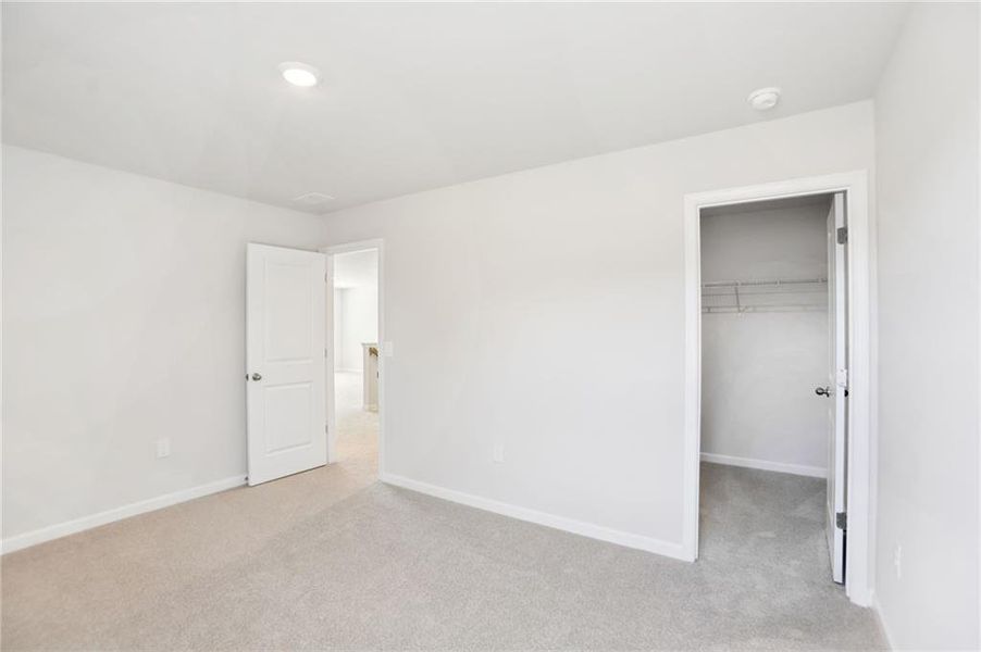 Spacious, unfurnished interior of a new home in Westmont Preserve, Powder Springs (Image 37).