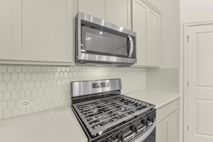 Close-up of interior finishes inside a home in Bridgeland, Cypress (Image 16).