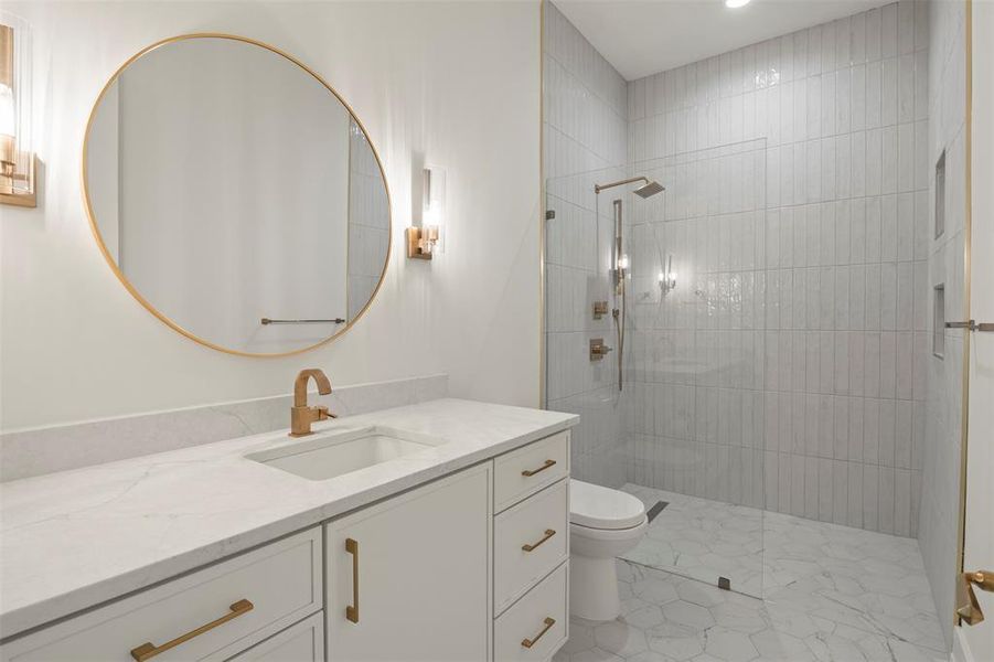 Bathroom featuring vanity, walk in shower, recessed lighting, and light tile patterned floors Bathroom featuring vanity, walk in shower, recessed lighting, and light tile patterned floors
