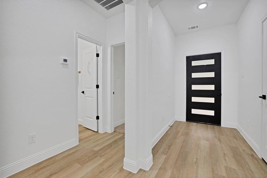 Foyer entrance featuring light wood-type flooring