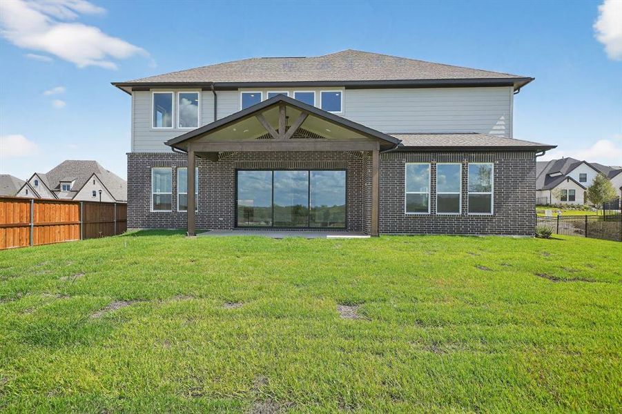 Exterior details and patio area of a home in Walsh Ranch, Fort Worth (Image 3).