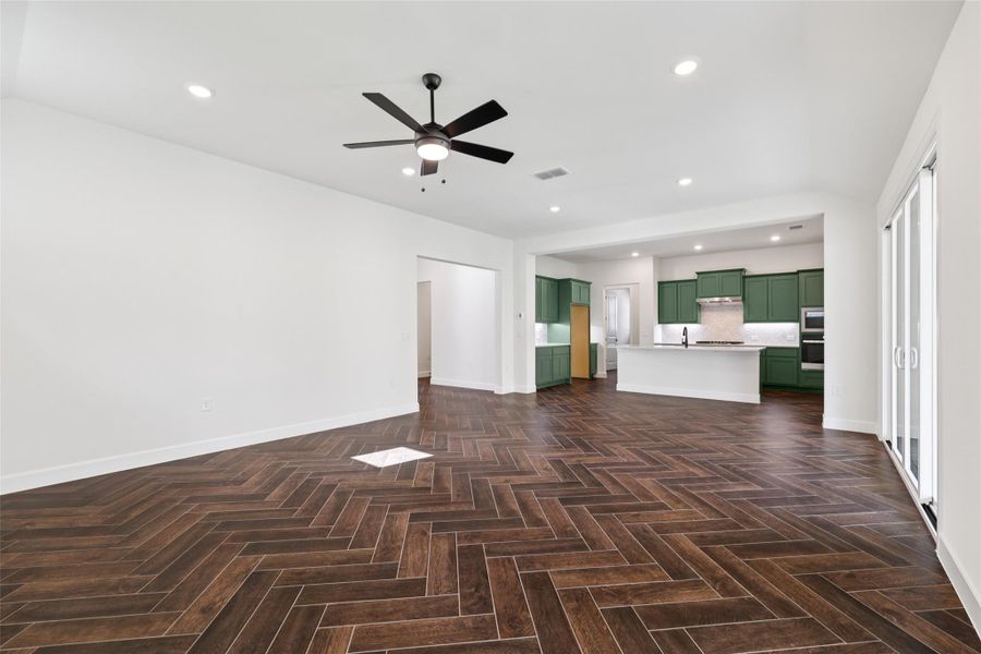 Unfurnished living room with ceiling fan and recessed lighting Unfurnished living room with ceiling fan and recessed lighting