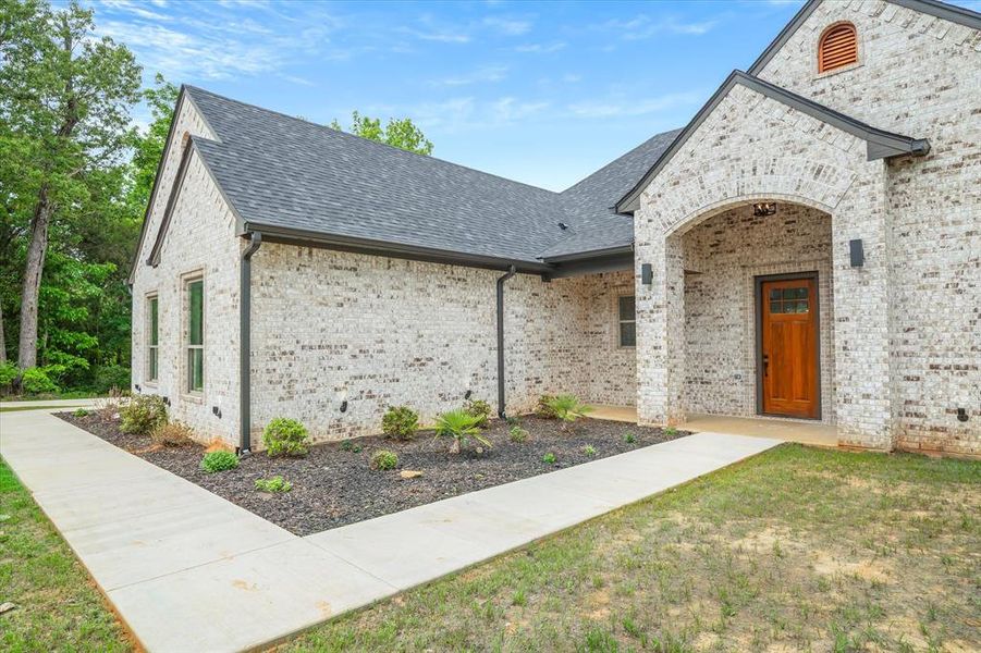Exterior details and patio area of a home in , Lindale (Image 28).