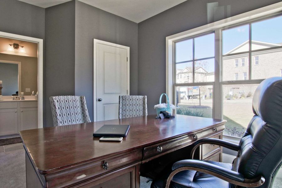 Representative furnished interior of a home built from the Barwick by KM Homes in Nickel Creek at Newnan Crossing, Newnan (Image 22).