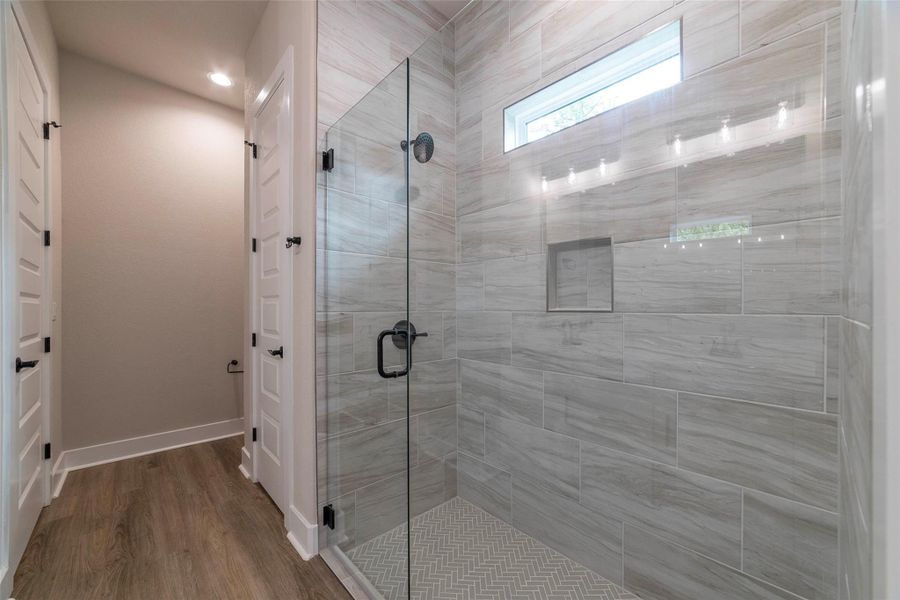Larhe shower with frameless glass