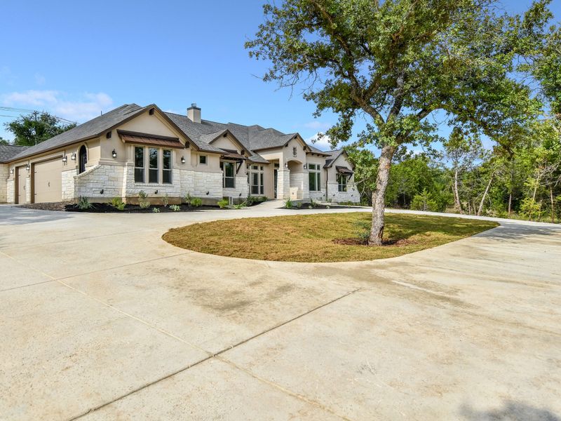 Representative exterior photo of a completed home built from the Coronado I by Giddens Homes in Clearwater Ranch, Liberty Hill, TX (Image 36).