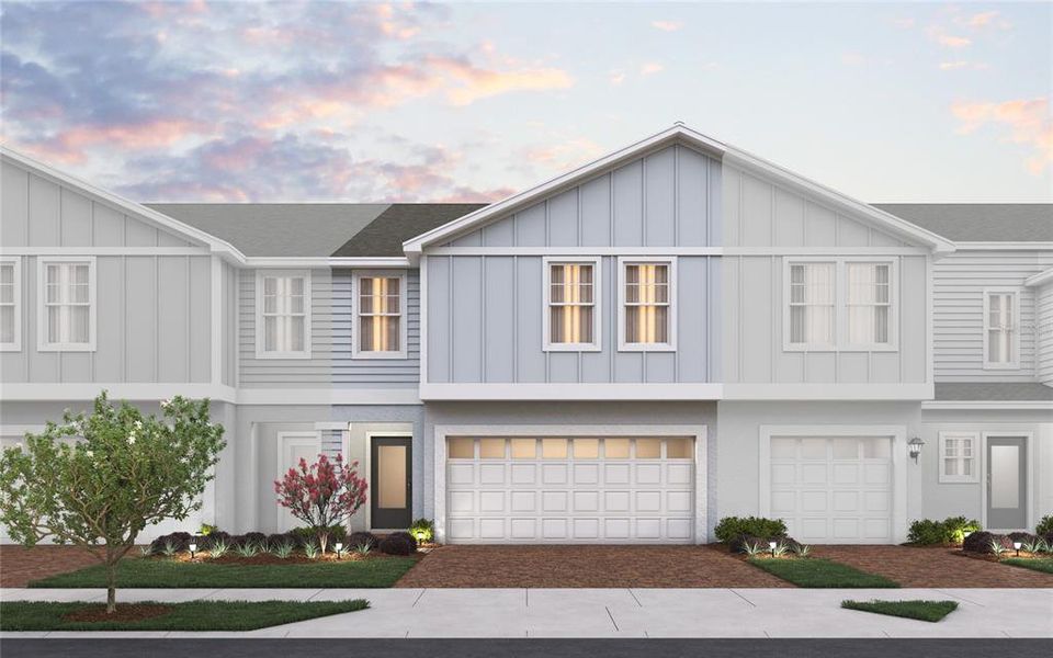 Front exterior of a new home in Blue Springs Reserve Townhomes, Howey-in-the-Hills, FL, highlighting curb appeal (Image 1). Front exterior of a new home in Blue Springs Reserve Townhomes, Howey-in-the-Hills, FL, highlighting curb appeal (Image 1).