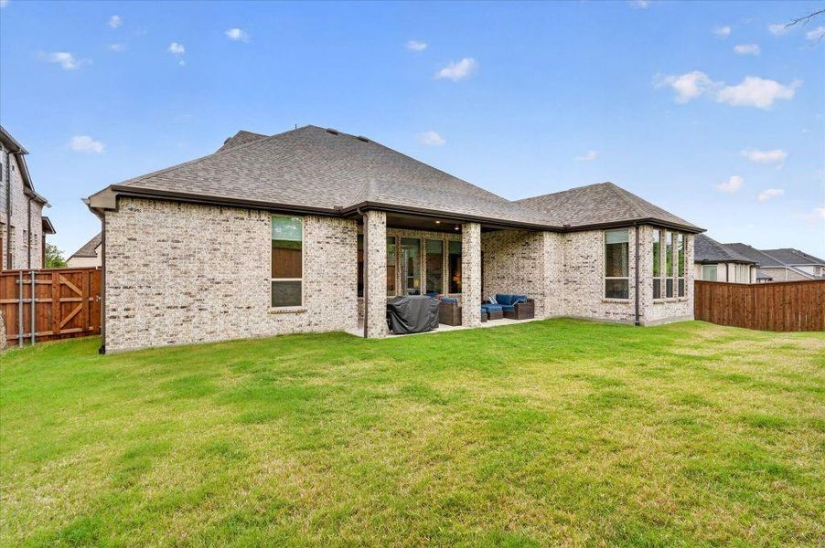 Exterior details and patio area of a home in Saddle Star Estates, Rockwall (Image 4).