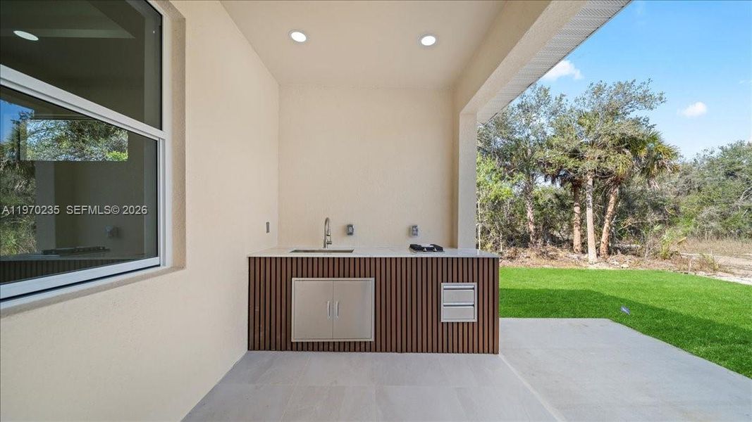Exterior details and patio area of a home in , Lehigh Acres (Image 24).