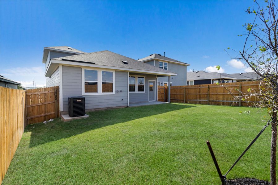 Front exterior of a new home in Marigold, Uhland, TX, highlighting curb appeal (Image 2). Front exterior of a new home in Marigold, Uhland, TX, highlighting curb appeal (Image 2).