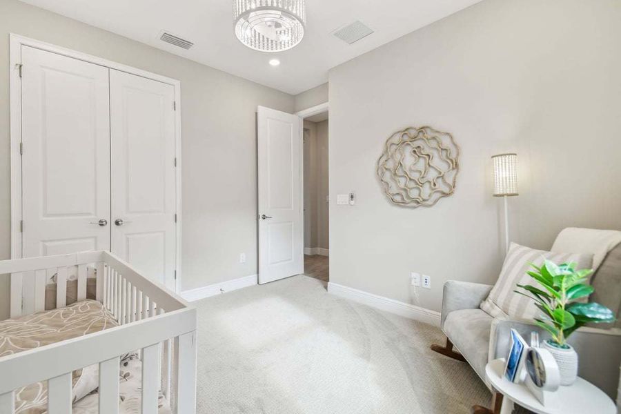Representative furnished interior of a home built from the 50' Sweetwater by William Ryan Homes in Tamarack at Two Rivers, Zephyrhills (Image 12).