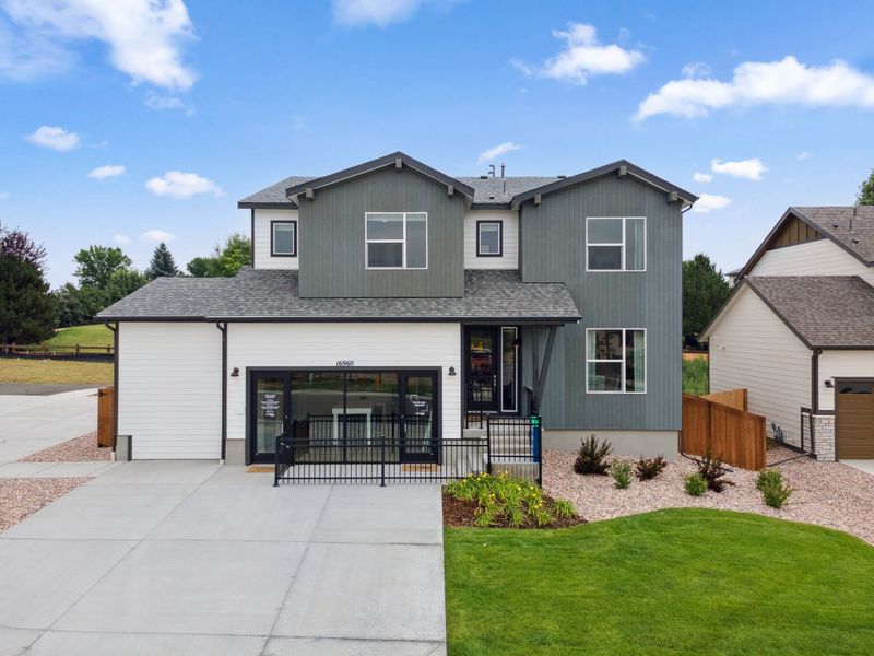 Representative exterior photo of a completed home built from the Silverton by Landsea Homes in Highlands Preserve, Mead, CO (Image 1).