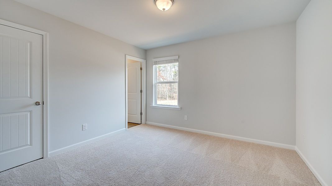 Furnished interior view inside a new home in Hamilton Lakes, Loganville (Image 23).