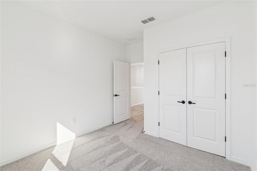 Spacious, unfurnished interior of a new home in Weslyn Park in Sunbridge 34', St. Cloud (Image 42).