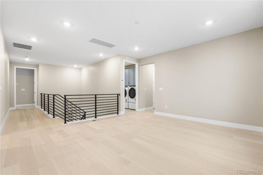 Spacious, unfurnished interior of a new home in Autograph at Lyric, Lone Tree (Image 46).