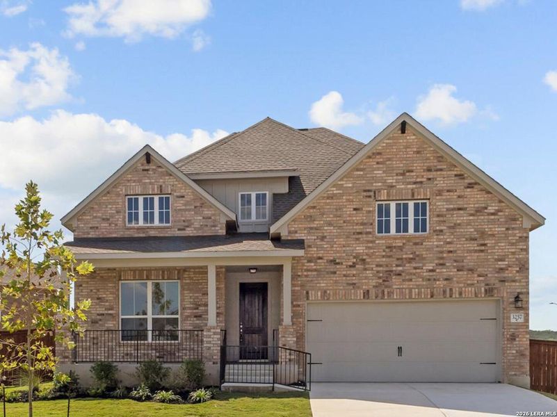 Front exterior of a new home in Homestead, Schertz, TX, highlighting curb appeal (Image 1). Front exterior of a new home in Homestead, Schertz, TX, highlighting curb appeal (Image 1).