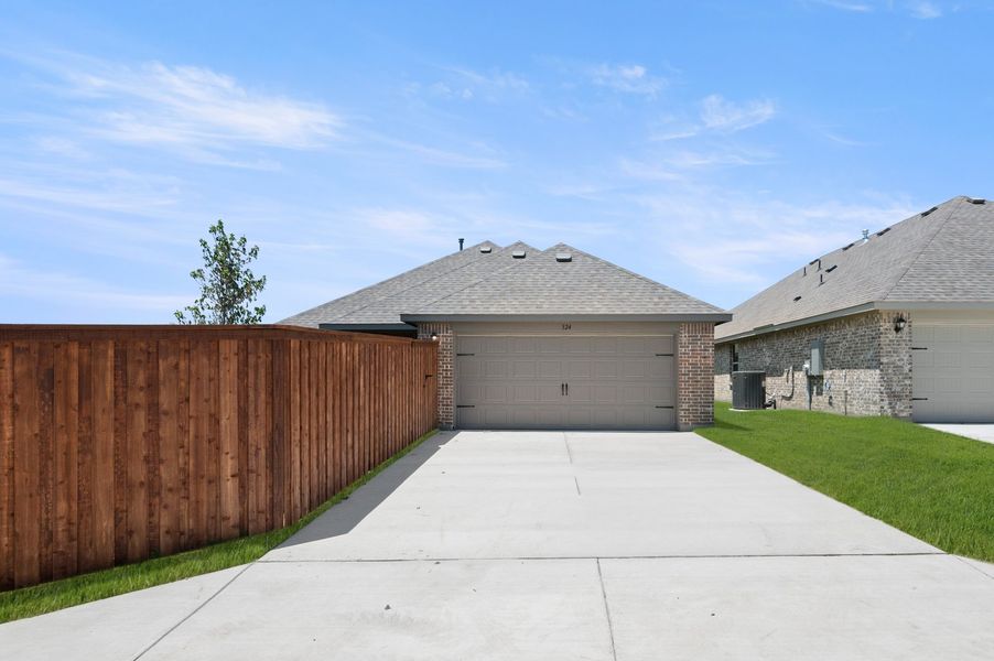 Front exterior of a new home in Redden Farms, Midlothian, TX, highlighting curb appeal (Image 27). Front exterior of a new home in Redden Farms, Midlothian, TX, highlighting curb appeal (Image 27).