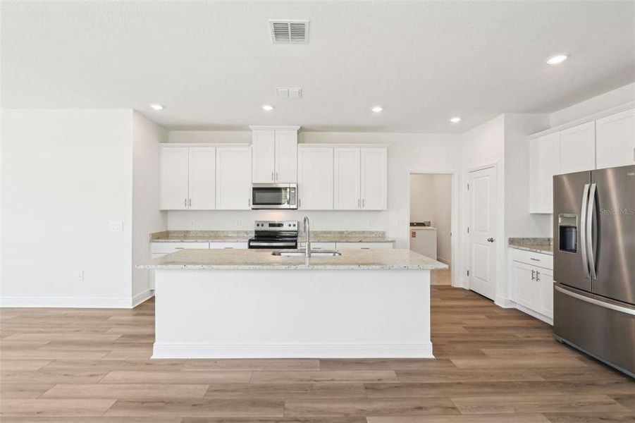 Furnished interior view inside a new home in Cyrene at Minneola - Villas, Minneola (Image 5).