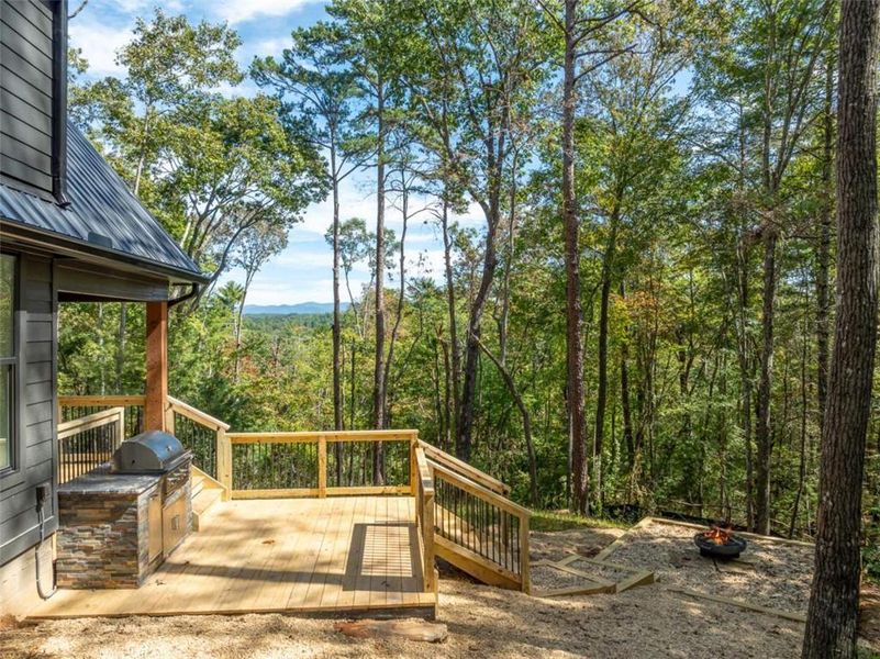 Exterior details and patio area of a home in , Ellijay (Image 25).