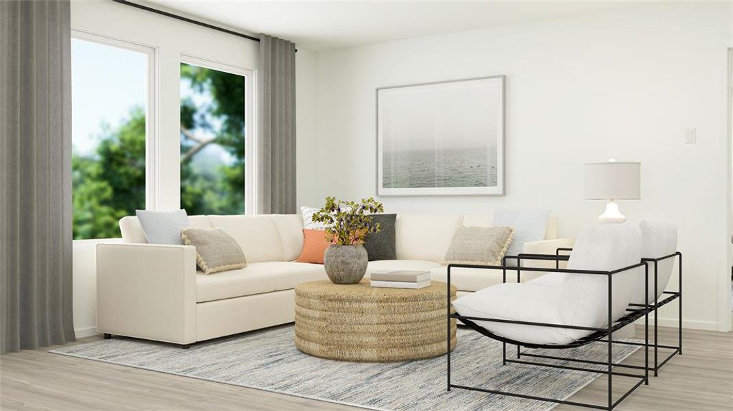 Living room with light hardwood / wood-style floors