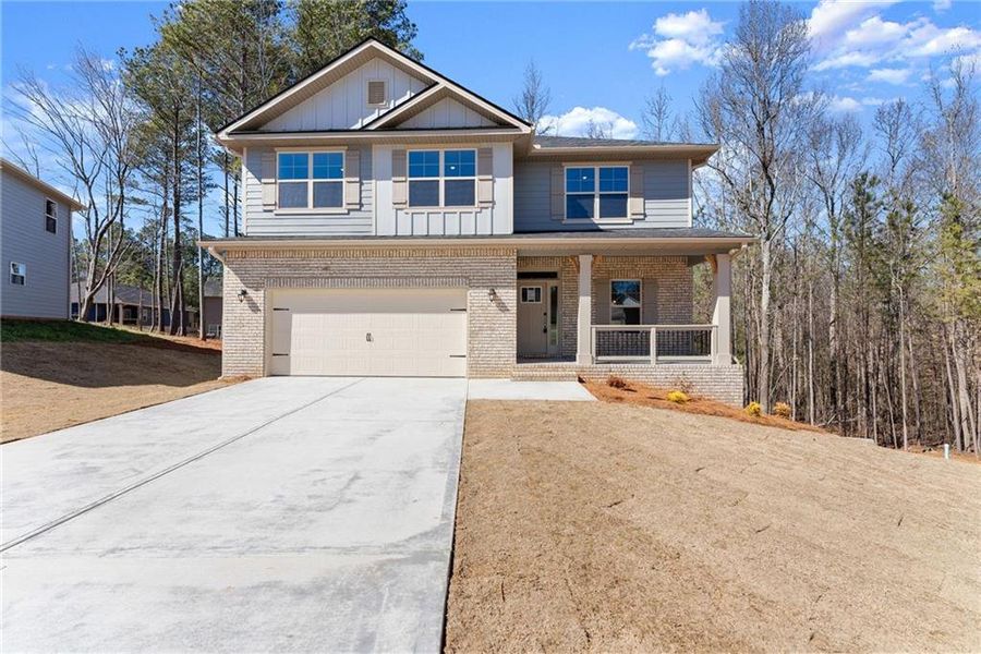 Front exterior of a new home in Magnolia Villas, Cornelia, GA, highlighting curb appeal (Image 25).