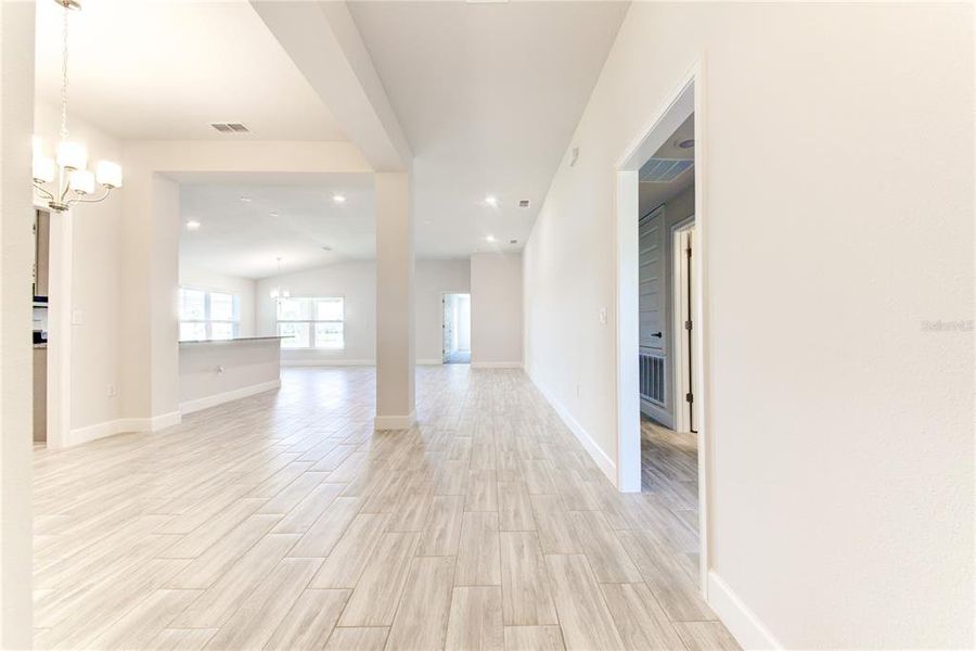 Spacious, unfurnished interior of a new home in Aviary at Rutland Ranch, Parrish (Image 22).