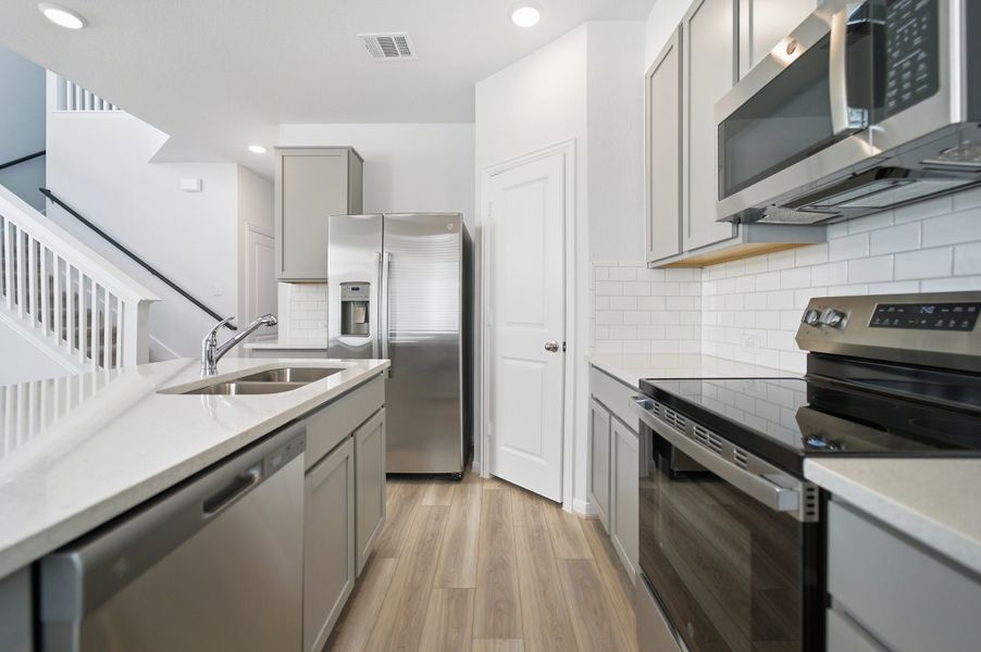 Furnished interior view inside a new home in Municipal Drive Townhomes, Leander (Image 7).