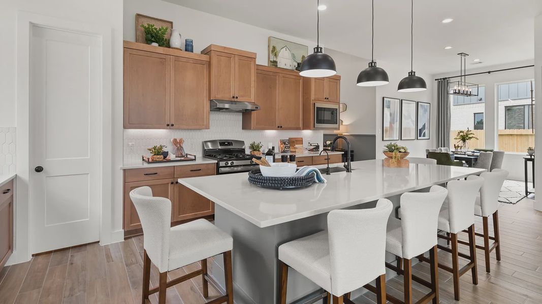 Representative furnished interior of a home built from the Hillcrest by Chesmar Homes in Artavia, Conroe (Image 11).