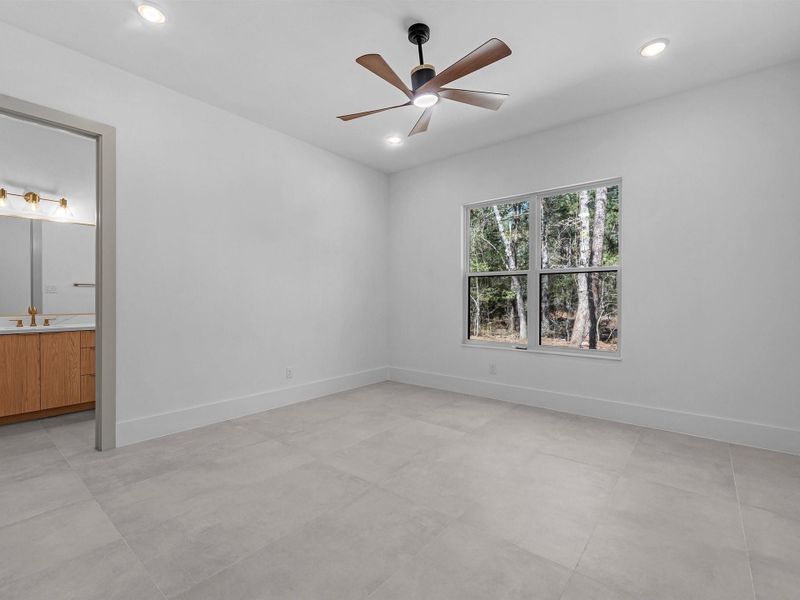 Secondary bedroom 1-Well-appointed secondary bedrooms offer comfort, privacy, and flexibility for family or guests.