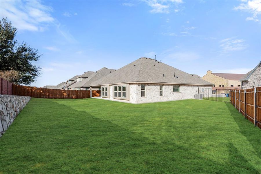 Exterior details and patio area of a home in The Enclave at Parks of Aledo, Aledo (Image 26).