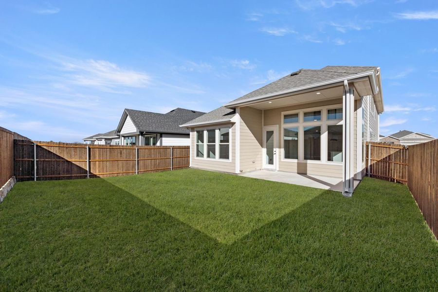 Exterior details and patio area of a home in The Meadows, Denton (Image 3). Exterior details and patio area of a home in The Meadows, Denton (Image 3).