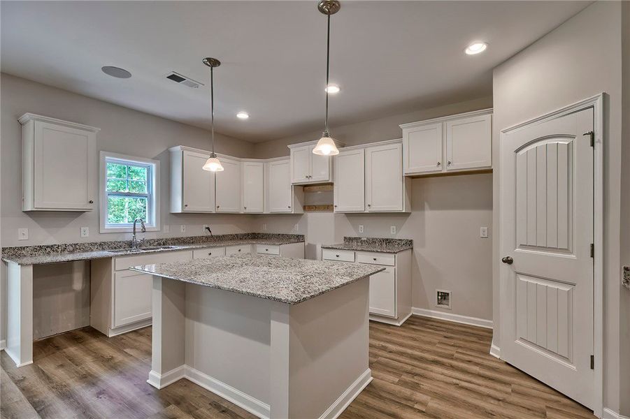This bright kitchen features ample counter space a