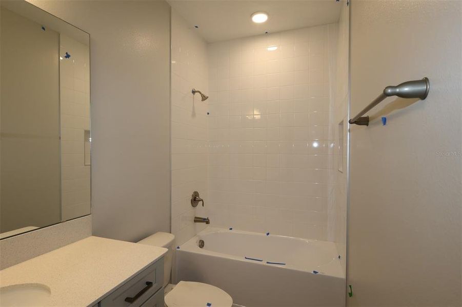 Furnished interior view inside a new home in Center Lake on the Park, St. Cloud (Image 6).