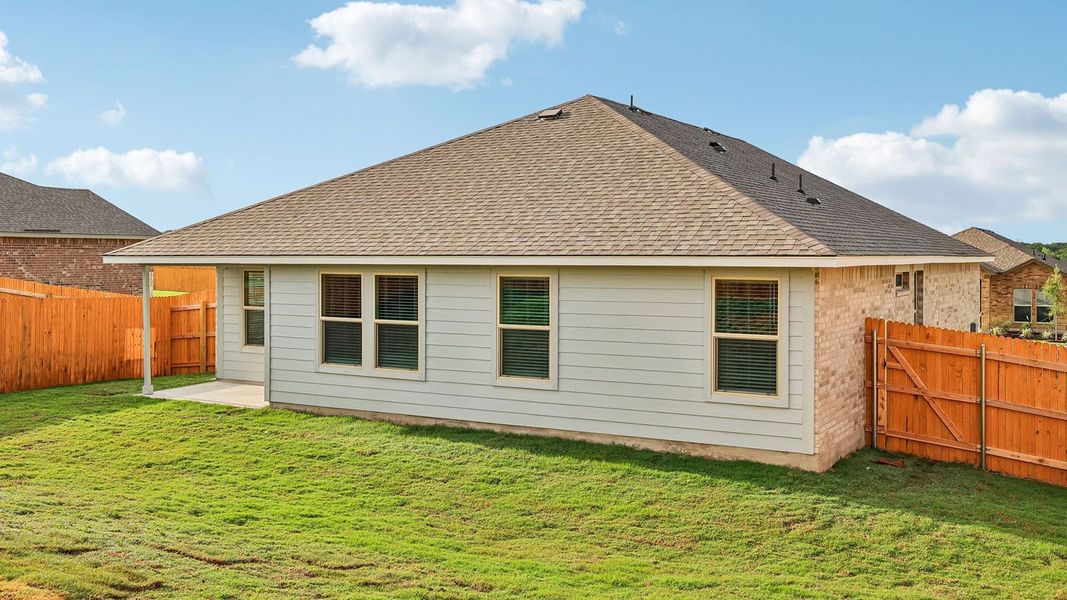 Exterior details and patio area of a home in Creekfall, Burnet (Image 3).