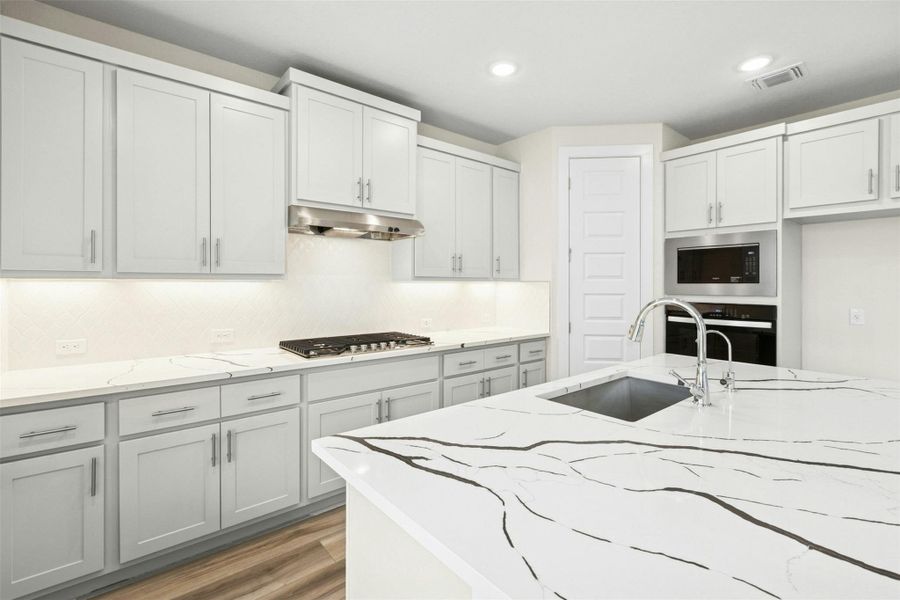 Furnished interior view inside a new home in University Heights, Round Rock (Image 9).