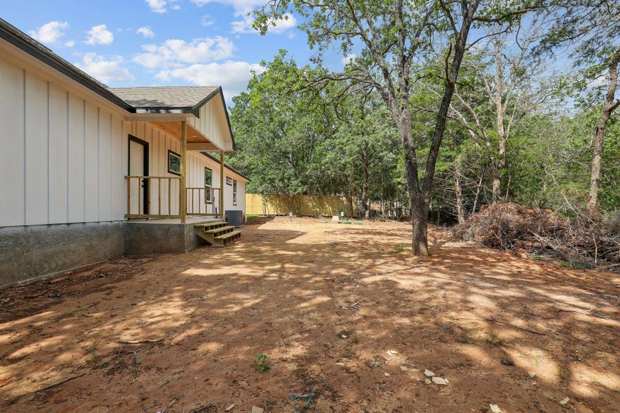 Exterior details and patio area of a home in , Bastrop (Image 16).