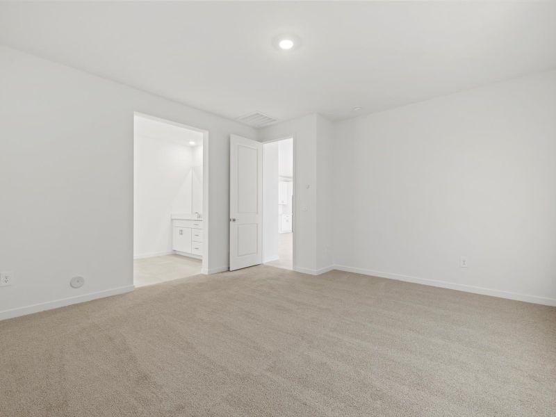 Spacious, unfurnished interior of a new home in Rancho Mirage Signature Series, Maricopa (Image 11).