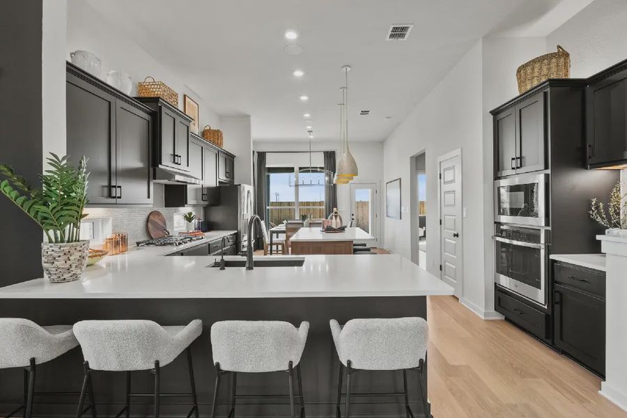 Representative furnished interior of a home built from the Dublin by Chesmar Homes in Legacy at Lake Dunlap, New Braunfels (Image 9).