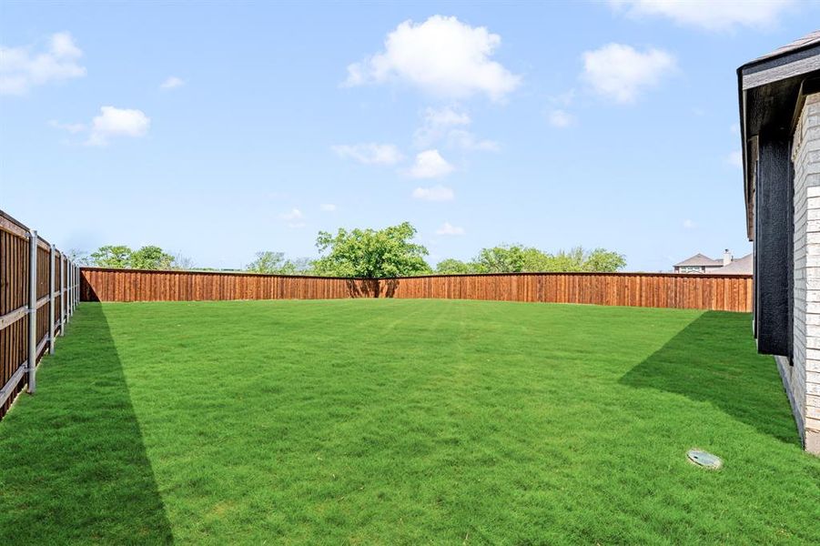 Exterior details and patio area of a home in Wildcat Ridge Phase 3, Godley (Image 24). Exterior details and patio area of a home in Wildcat Ridge Phase 3, Godley (Image 24).