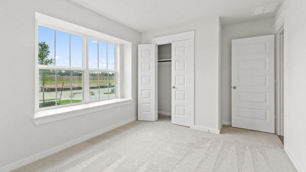 Representative furnished interior of a home built from the Avalon by Brightland Homes in Cielo, Conroe (Image 14).