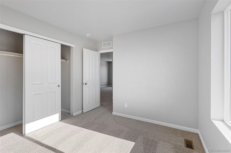 Spacious, unfurnished interior of a new home in Highlands Preserve, Mead (Image 13).
