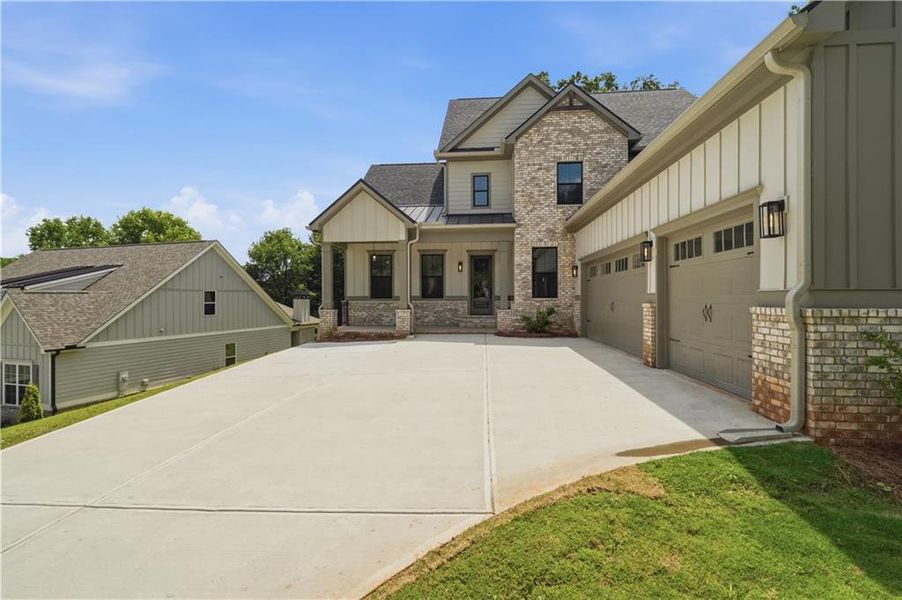 Front exterior of a new home in , Jefferson, GA, highlighting curb appeal (Image 25).