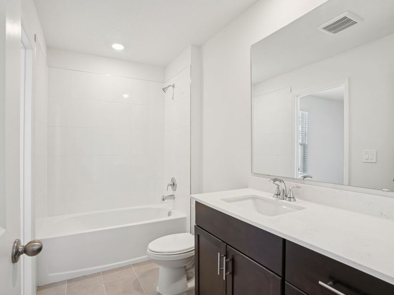 Furnished interior view inside a new home in The Meadow at Crossprairie Townes, St. Cloud (Image 7).