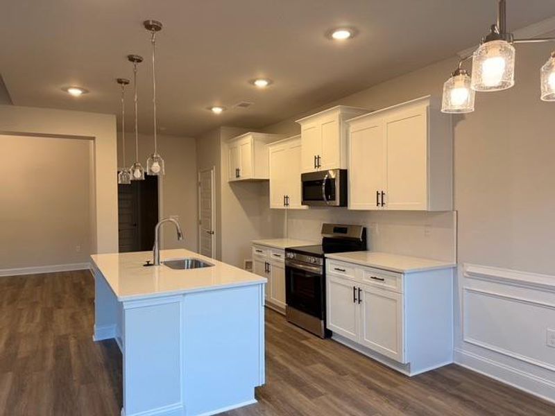 Furnished interior view inside a new home in Magnolia Villas, Cornelia (Image 3).