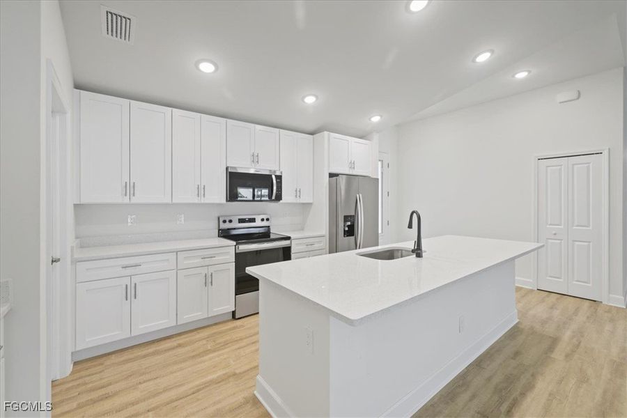 Furnished interior view inside a new home in Cape Coral, Cape Coral (Image 9).