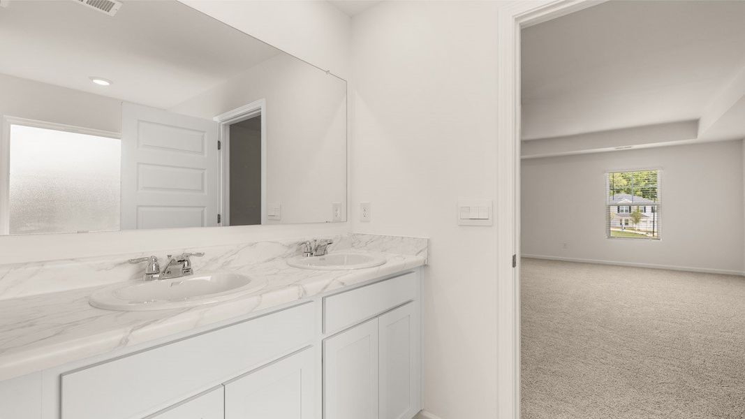 Representative furnished interior of a home built from the Packard by D.R. Horton in Glenmaye, Hampton (Image 12).