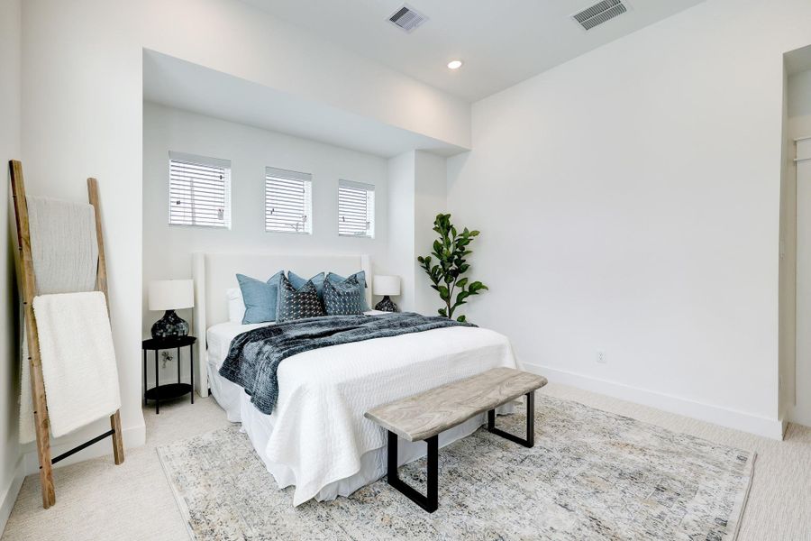 Serene Master Suite: A spacious retreat boasting natural light and modern elegance, perfect for unwinding. Serene Master Suite: A spacious retreat boasting natural light and modern elegance, perfect for unwinding.