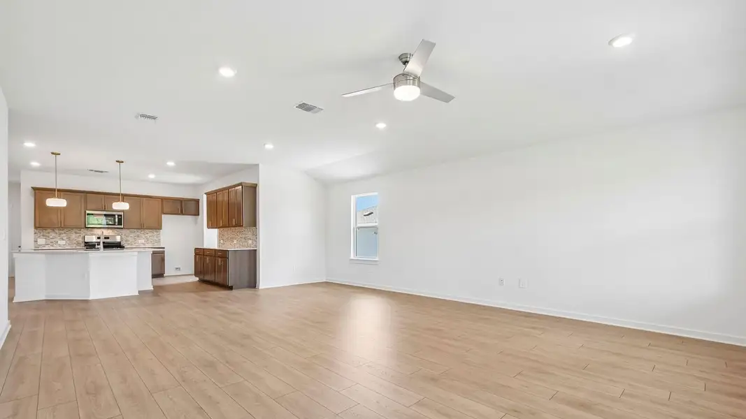 Spacious, unfurnished interior of a new home in Trails at Wildhorse, Austin (Image 12).