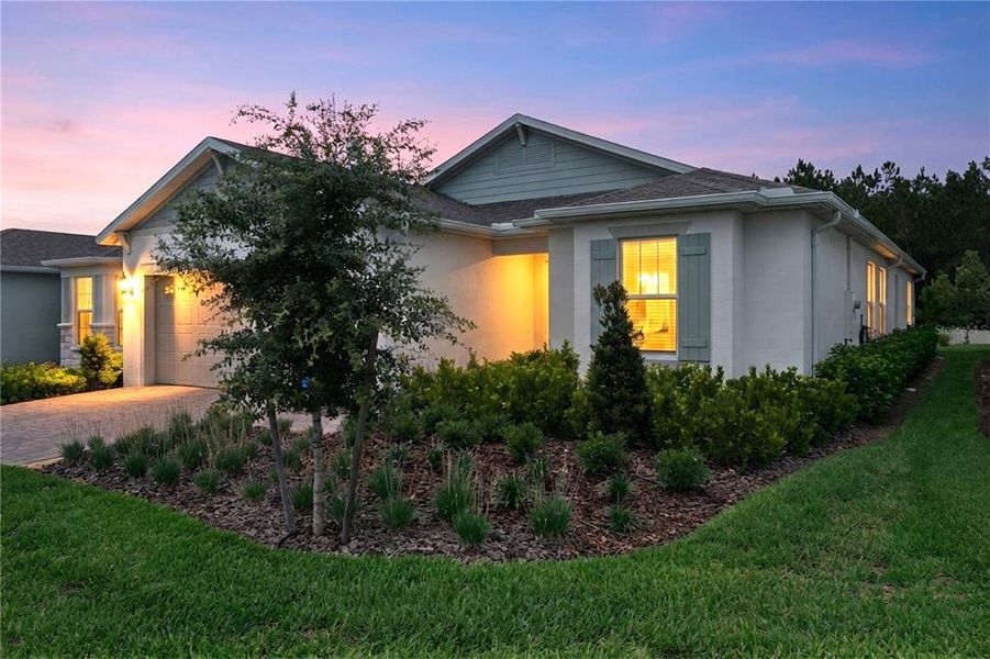 Front exterior of a new home in , Minneola, FL, highlighting curb appeal (Image 2). Front exterior of a new home in , Minneola, FL, highlighting curb appeal (Image 2).